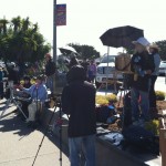Painting shoulder to shoulder along Monterey Wharf